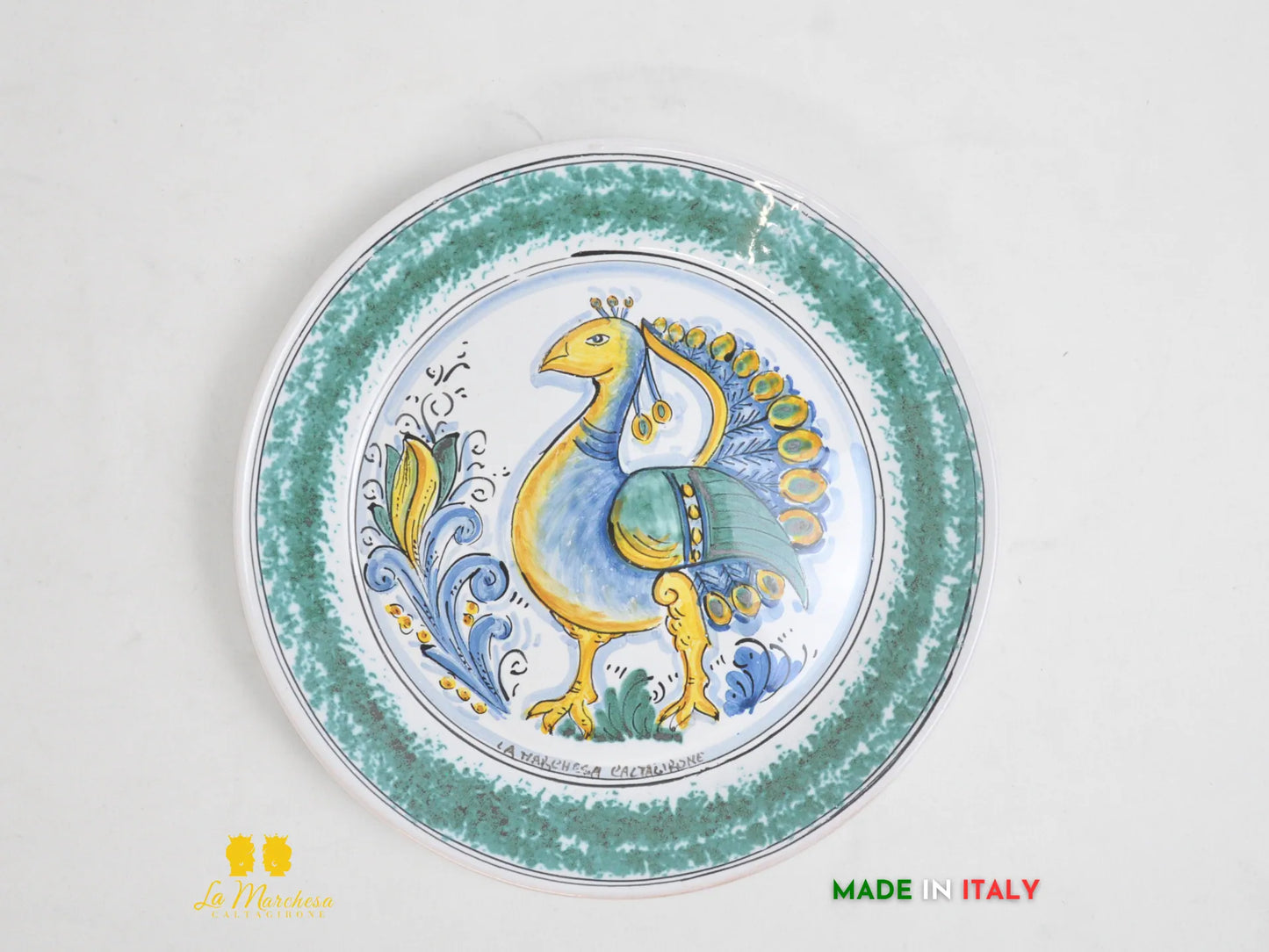 Piatto in Ceramica di Caltagirone decorato Fangotto disegno pavone