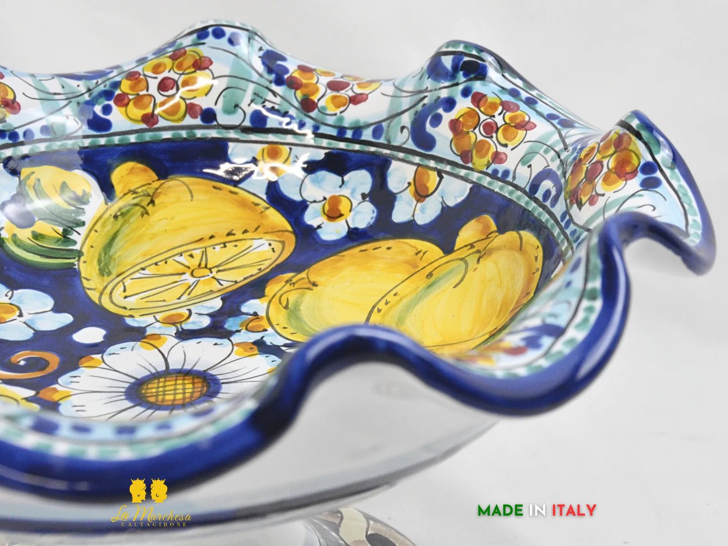 fruttiera con piedistallo in ceramica